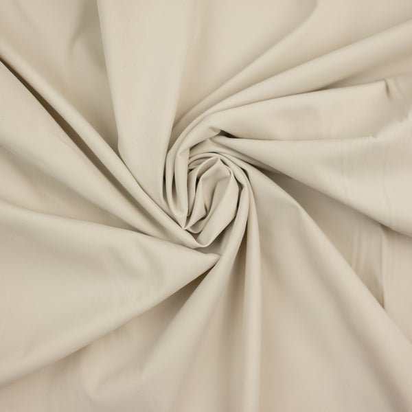 Vékony rugalmas szövet, 100% poliészter, világos bézs színű, szélesség 145 cm